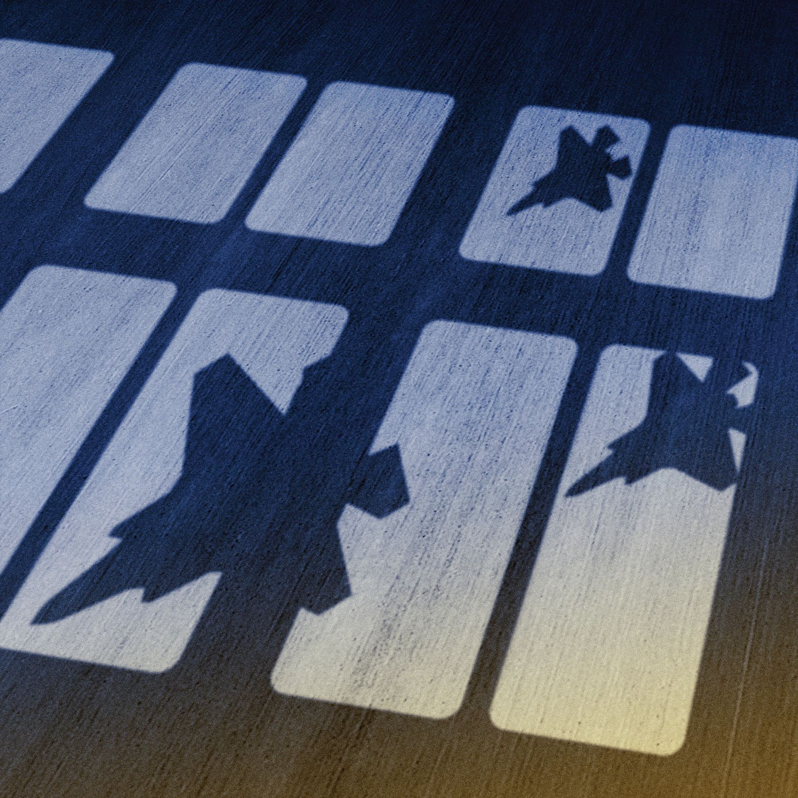 A shadow of windows and fighter jets